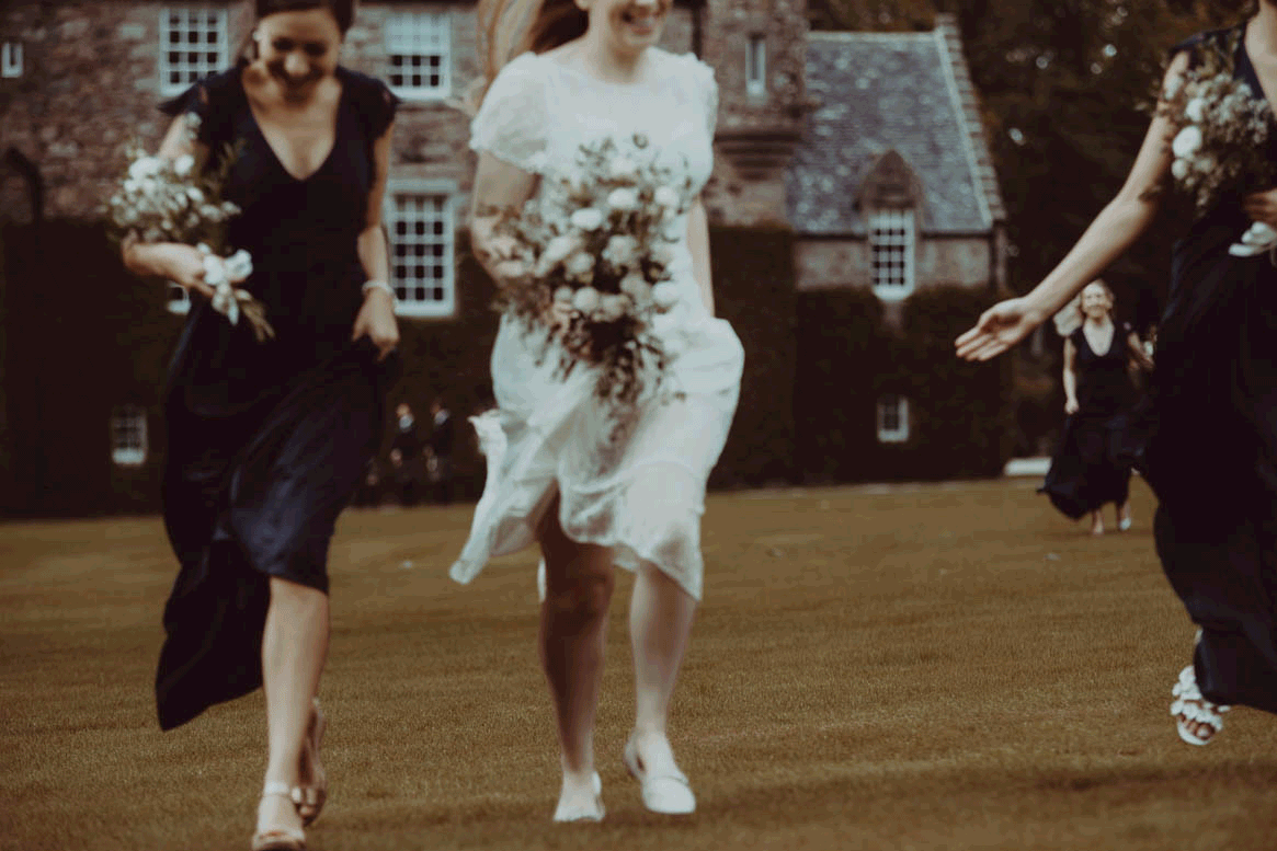Schivas House Wedding - running bride and bridesmaids