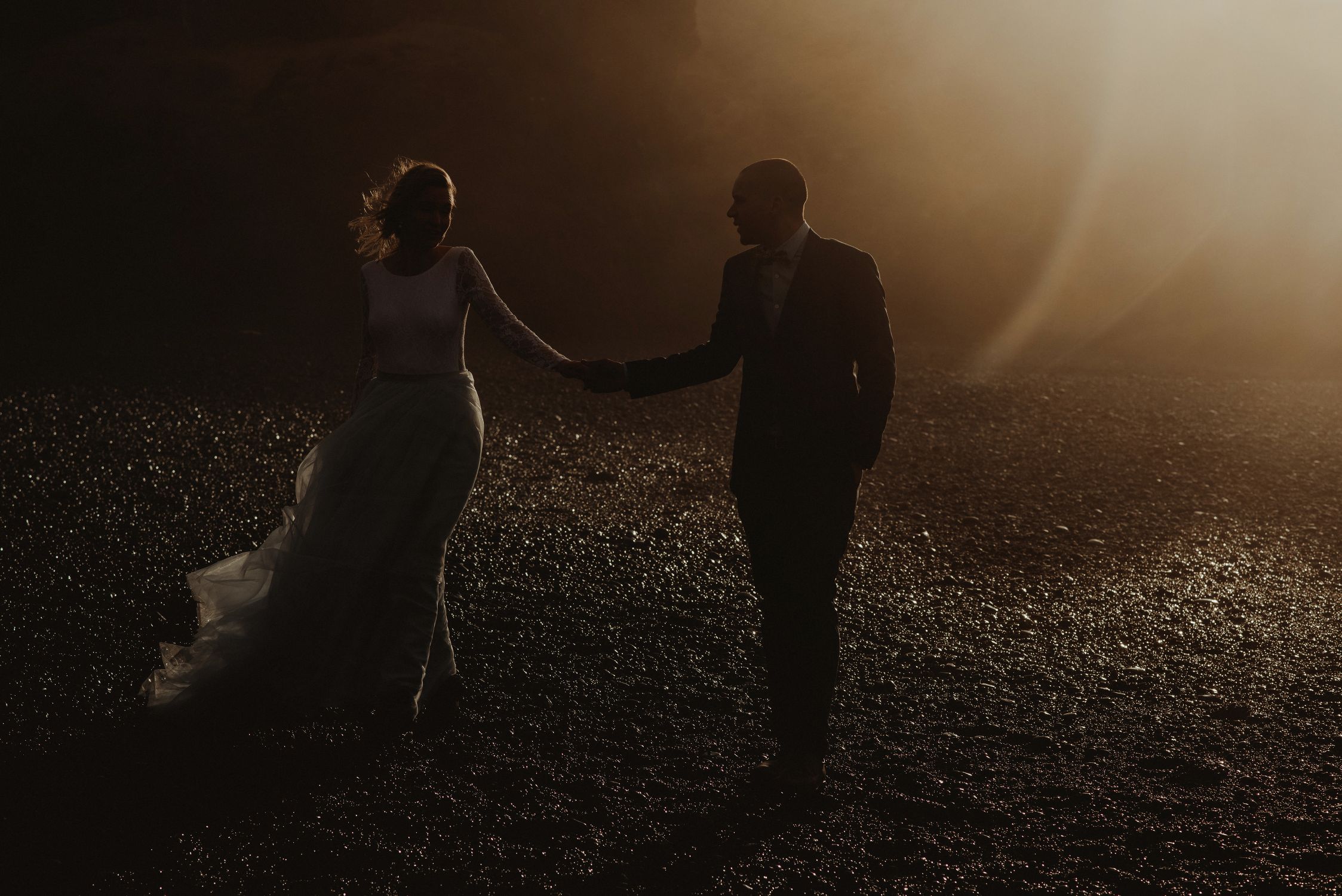 Snaefellsnes bride and groom walking in the mist