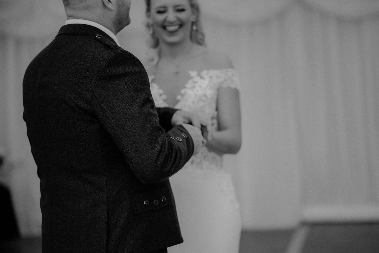 Bride and groom laughing at their wedding at Elsick House